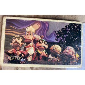 Vintage TBS Card With Cartoon Characters & Plane Graphic